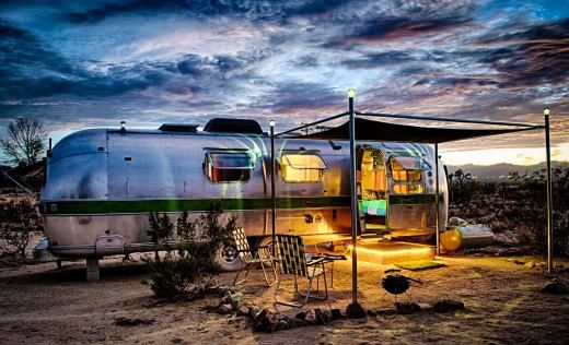 This meme is an image of a camper van parked in a desert landscape, with a small table and chairs set up outside. The image is captioned "I've been living in my camper van for 3 months and I've finally found my home". The image is likely humorous because it's a common trope for people to live in camper vans for a few months before deciding to settle down, but in this case, the person has been living in the camper van for three months, implying that they've been living in it for a long time and have finally found a sense of home.